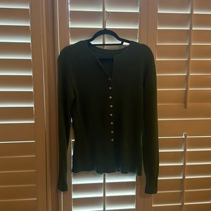 Kelly green sweater with buttons and ruffle bottom
